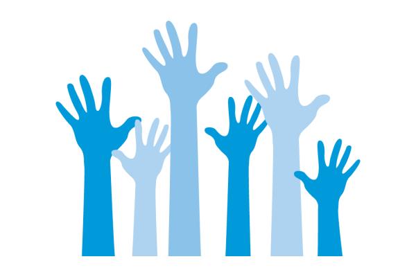 Volunteer hands raised