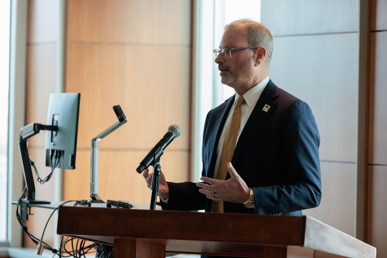 Man speaking at podium