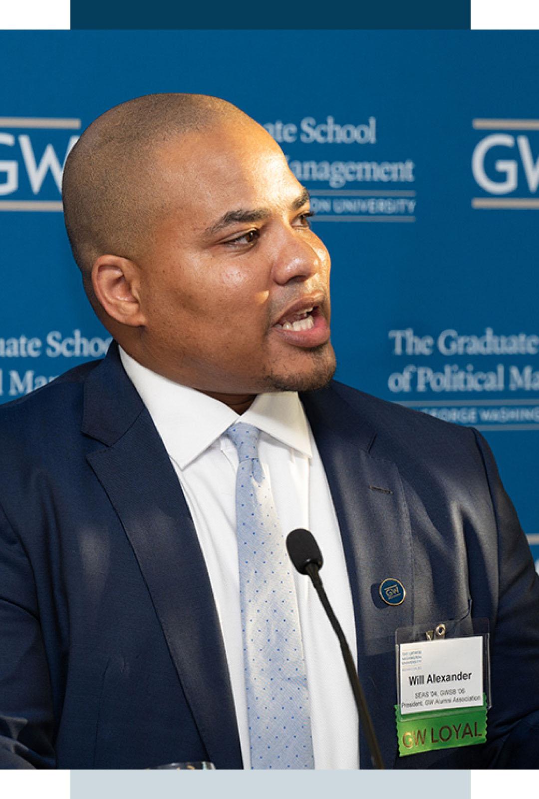 Will Alexander in suit, GSPM alumnus